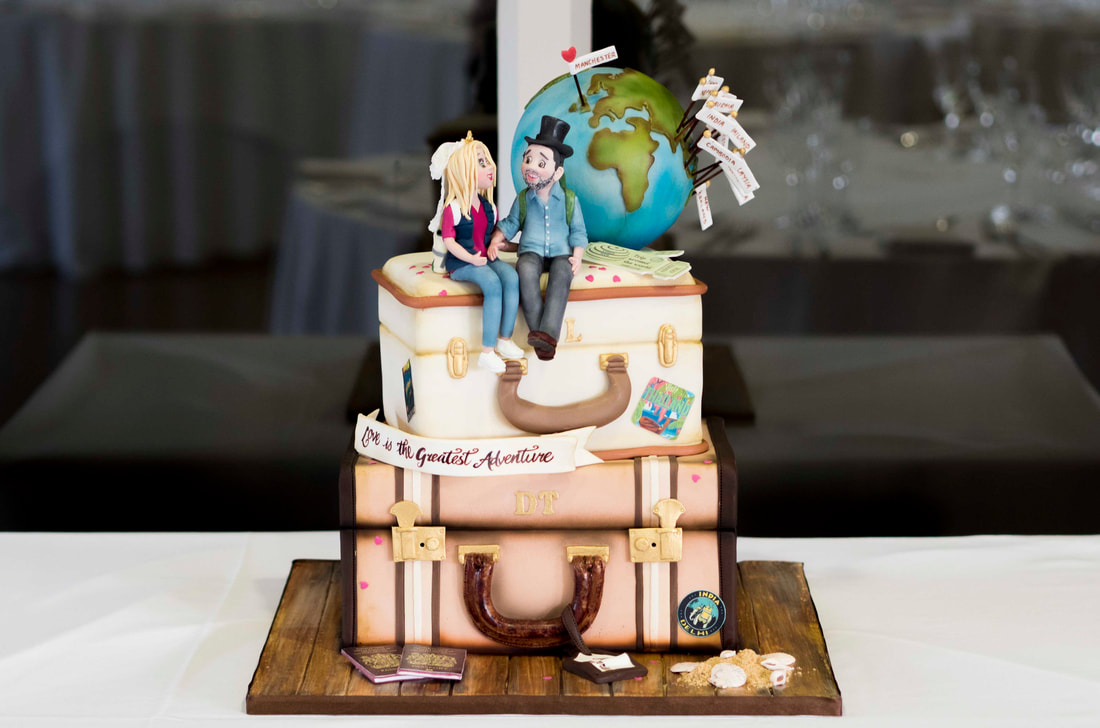 Travel suitcases wedding cake at Colshaw Hall, Cheshire