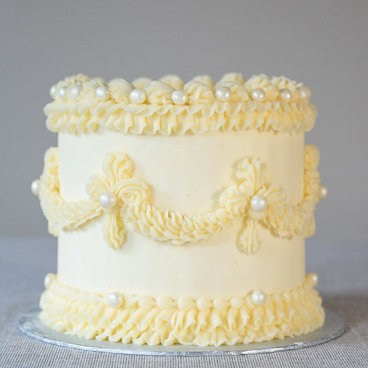 Frills and Pearls celebration cake