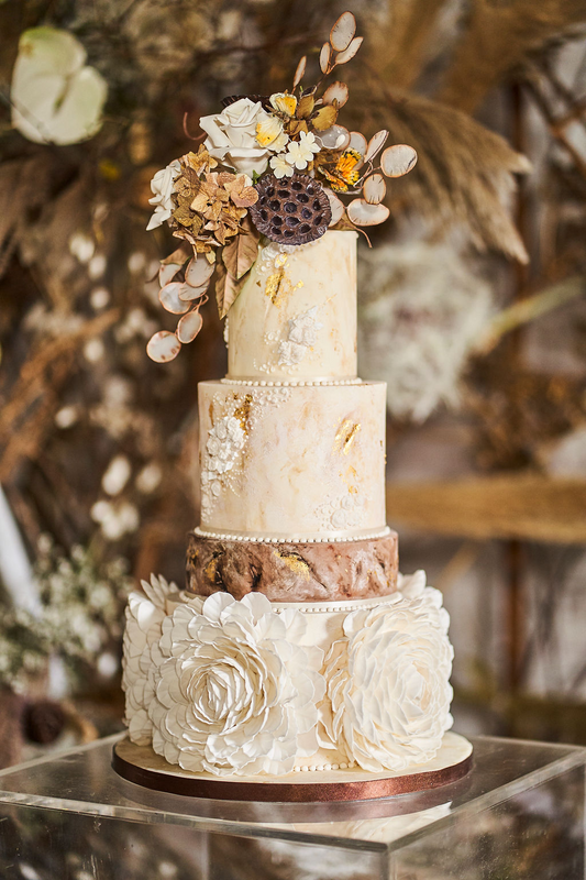 3 tier autumnal wedding cake with large white flower details, gold leaf, and sugar dried flowers 23