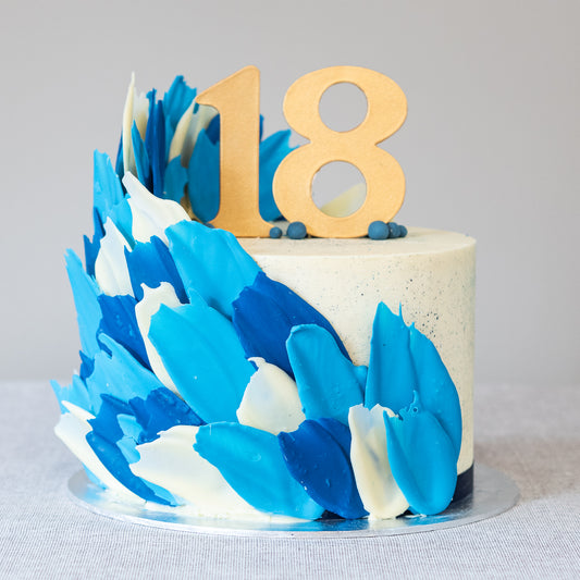 Add an age topper to your celebration cake