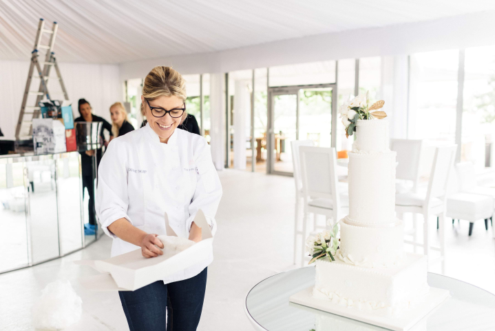 Suzanne Thorp setting up a wedding cake in Yorkshire