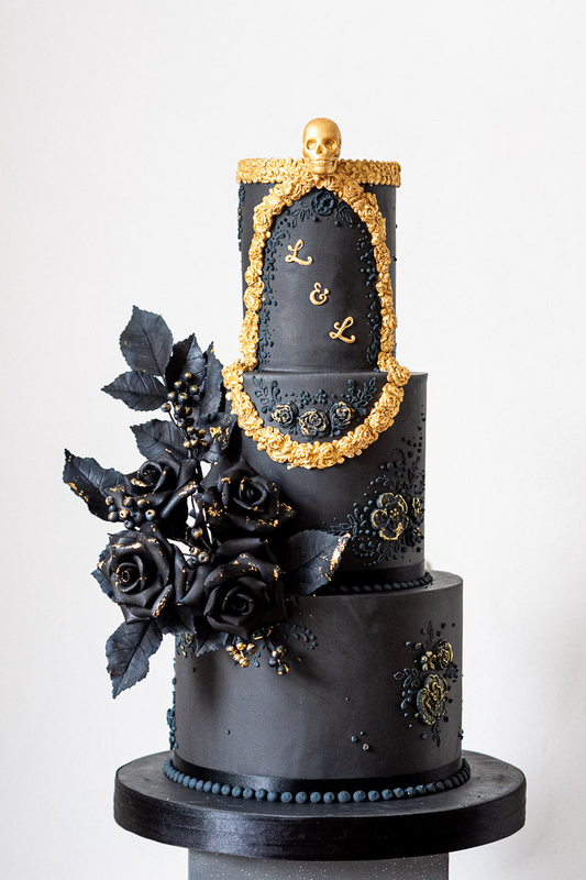 3 tier modern black and gold wedding cake with gold monogram, gold leaf detail and black sugar flowers 8